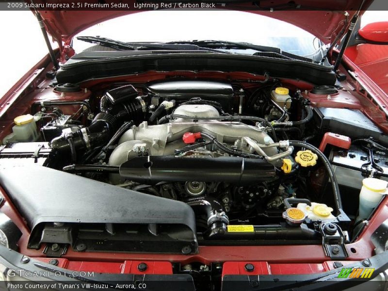 Lightning Red / Carbon Black 2009 Subaru Impreza 2.5i Premium Sedan