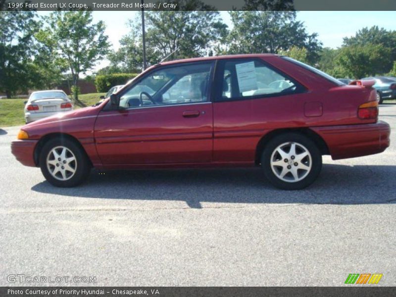 Toreador Red Metallic / Gray 1996 Ford Escort LX Coupe