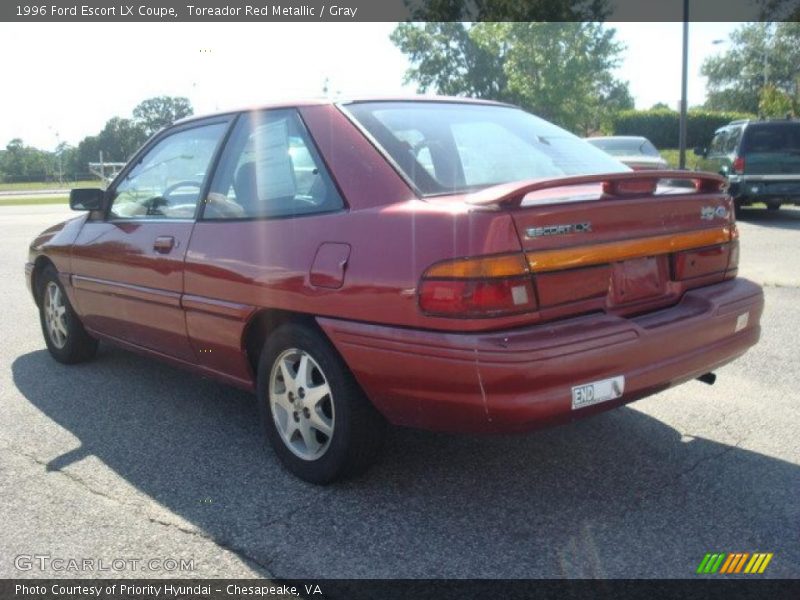 Toreador Red Metallic / Gray 1996 Ford Escort LX Coupe