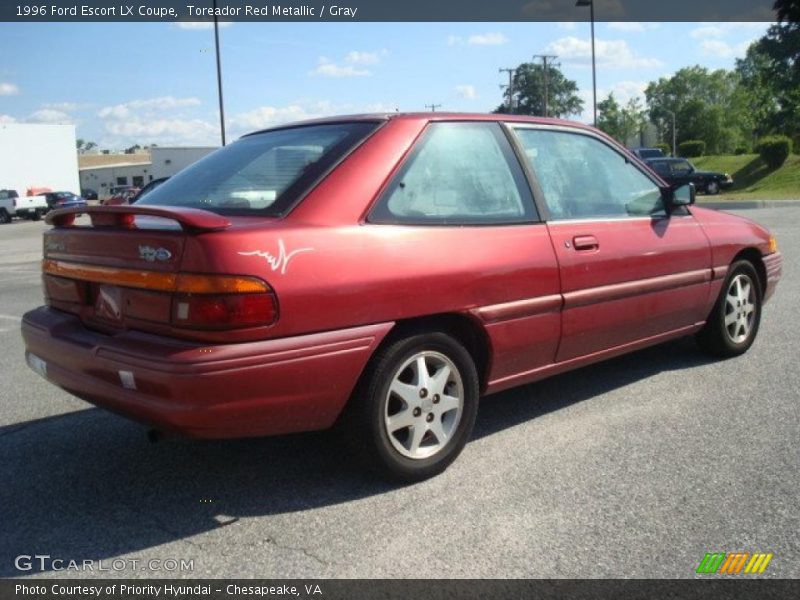 Toreador Red Metallic / Gray 1996 Ford Escort LX Coupe