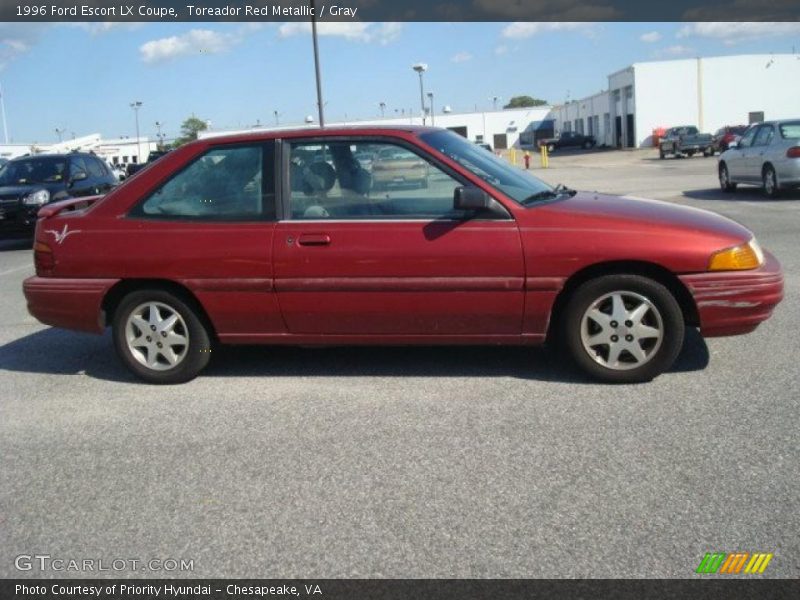 Toreador Red Metallic / Gray 1996 Ford Escort LX Coupe