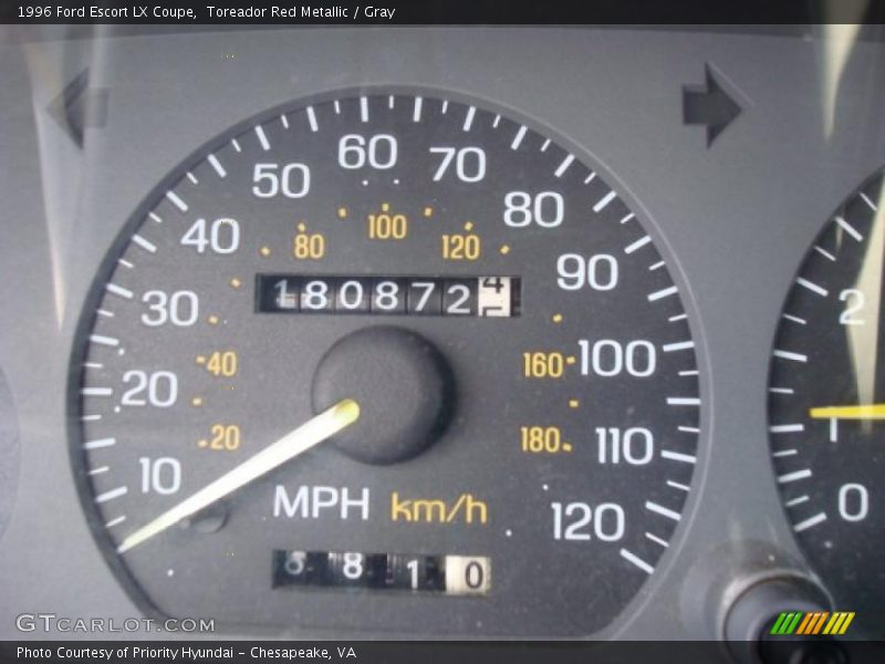 Toreador Red Metallic / Gray 1996 Ford Escort LX Coupe