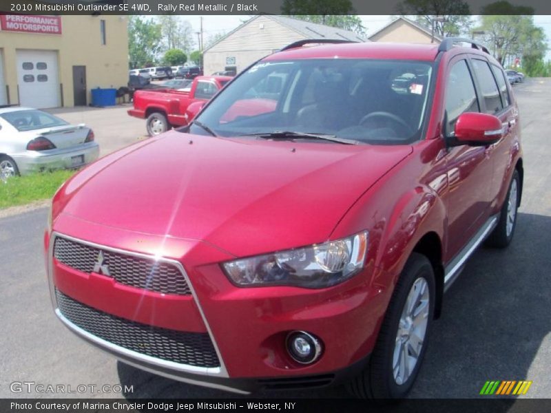 Rally Red Metallic / Black 2010 Mitsubishi Outlander SE 4WD