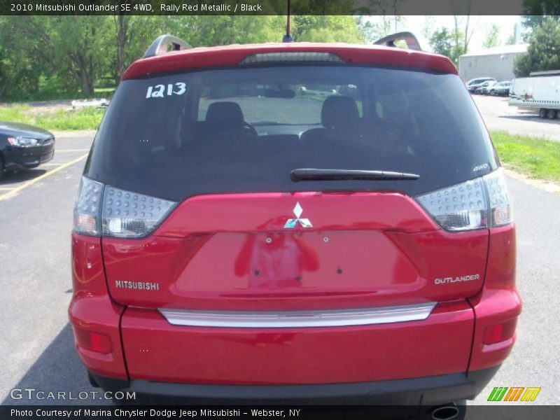 Rally Red Metallic / Black 2010 Mitsubishi Outlander SE 4WD