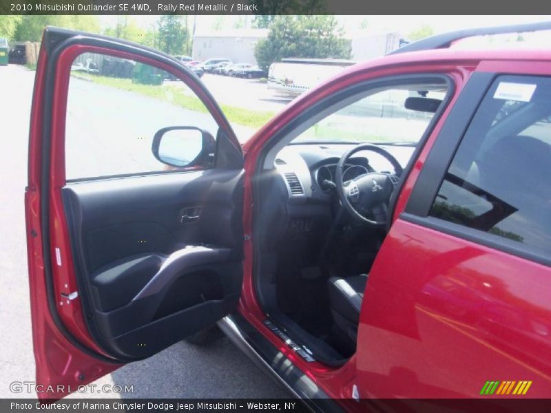 Rally Red Metallic / Black 2010 Mitsubishi Outlander SE 4WD