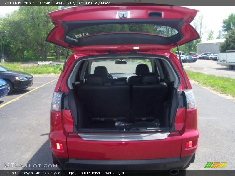 Rally Red Metallic / Black 2010 Mitsubishi Outlander SE 4WD