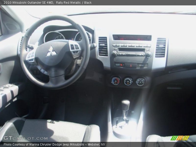 Rally Red Metallic / Black 2010 Mitsubishi Outlander SE 4WD
