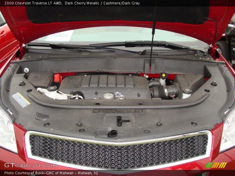 Dark Cherry Metallic / Cashmere/Dark Gray 2009 Chevrolet Traverse LT AWD