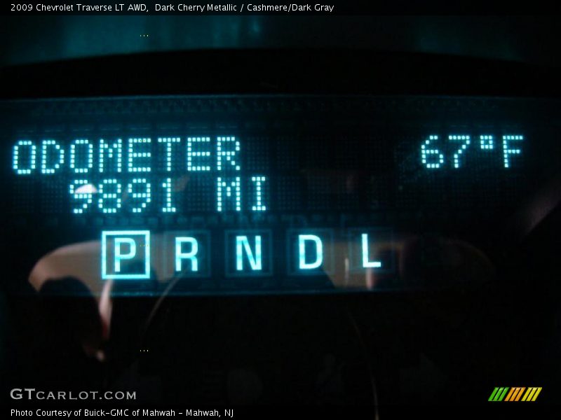 Dark Cherry Metallic / Cashmere/Dark Gray 2009 Chevrolet Traverse LT AWD