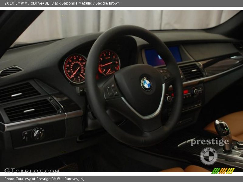 Black Sapphire Metallic / Saddle Brown 2010 BMW X5 xDrive48i
