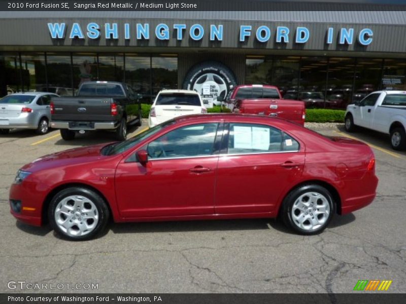 Sangria Red Metallic / Medium Light Stone 2010 Ford Fusion SE