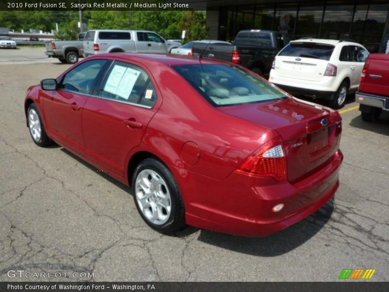 Sangria Red Metallic / Medium Light Stone 2010 Ford Fusion SE