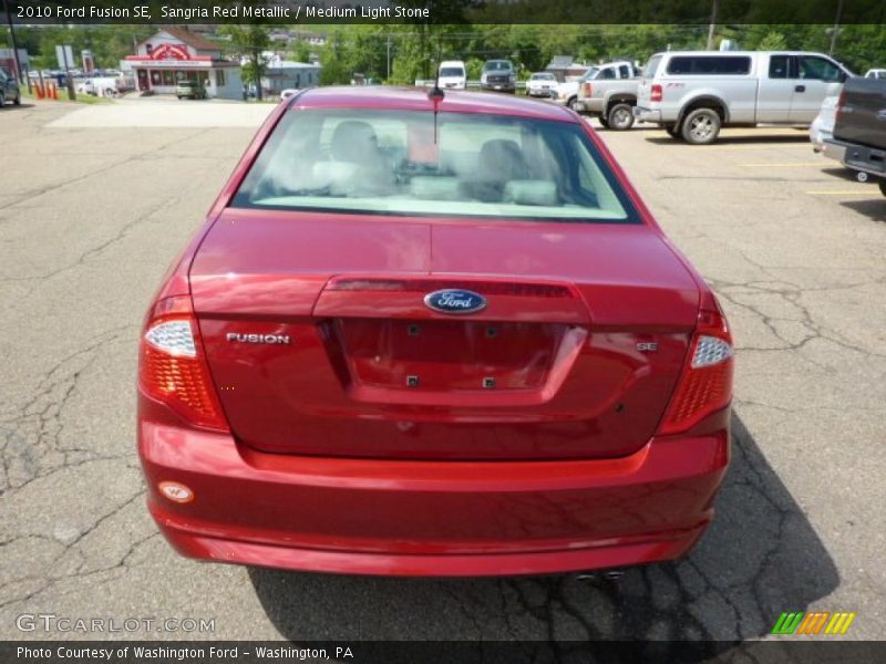 Sangria Red Metallic / Medium Light Stone 2010 Ford Fusion SE