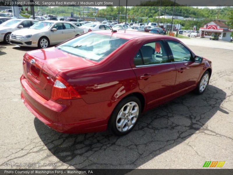 Sangria Red Metallic / Medium Light Stone 2010 Ford Fusion SE
