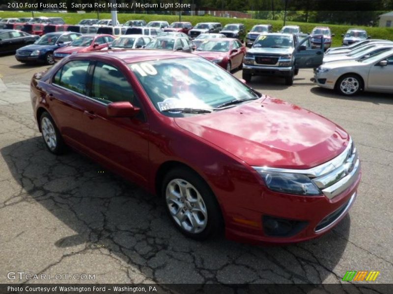 Sangria Red Metallic / Medium Light Stone 2010 Ford Fusion SE