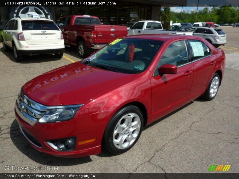 Sangria Red Metallic / Medium Light Stone 2010 Ford Fusion SE