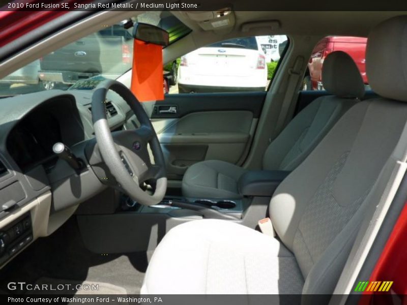 Sangria Red Metallic / Medium Light Stone 2010 Ford Fusion SE