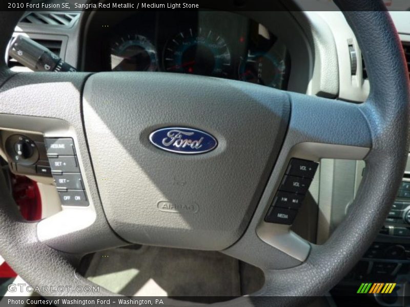 Sangria Red Metallic / Medium Light Stone 2010 Ford Fusion SE