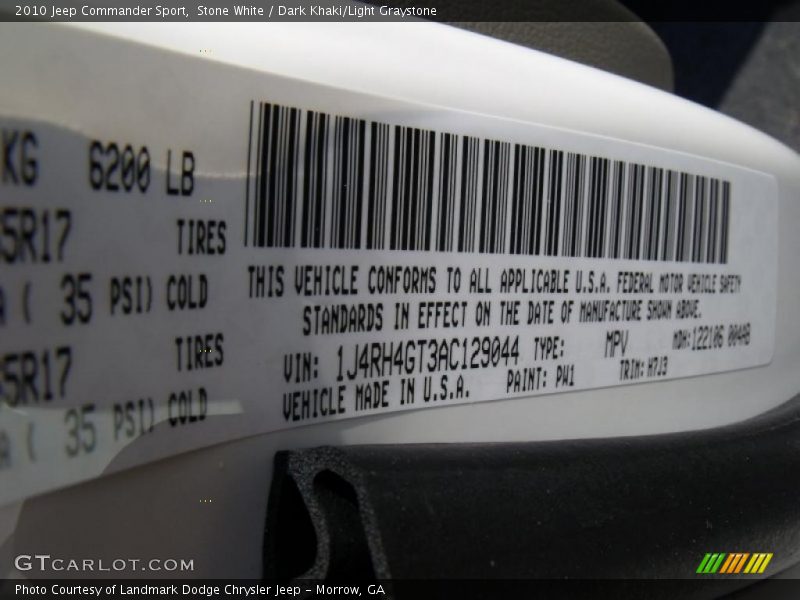 Stone White / Dark Khaki/Light Graystone 2010 Jeep Commander Sport