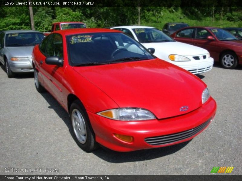 Bright Red / Gray 1995 Chevrolet Cavalier Coupe