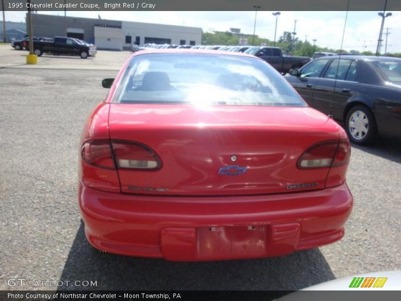 Bright Red / Gray 1995 Chevrolet Cavalier Coupe