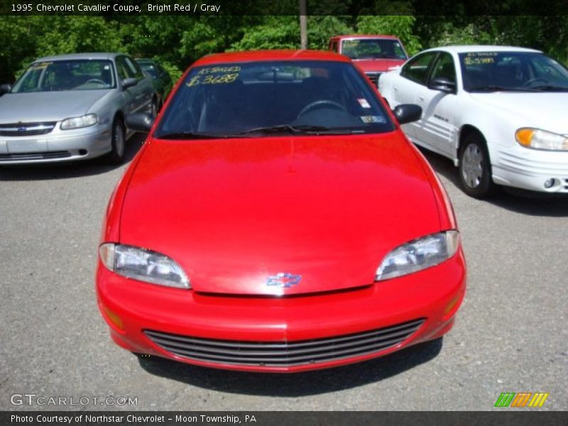 Bright Red / Gray 1995 Chevrolet Cavalier Coupe
