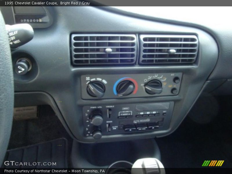 Bright Red / Gray 1995 Chevrolet Cavalier Coupe