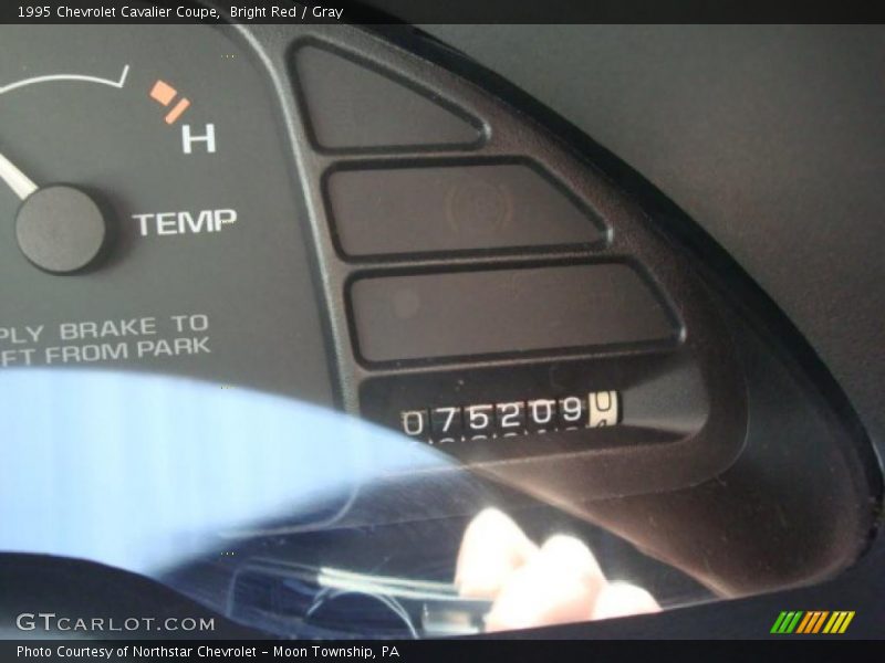 Bright Red / Gray 1995 Chevrolet Cavalier Coupe