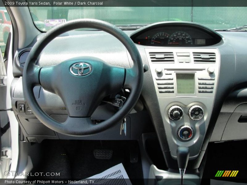 Polar White / Dark Charcoal 2009 Toyota Yaris Sedan