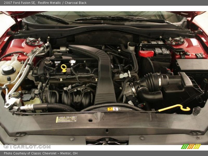Redfire Metallic / Charcoal Black 2007 Ford Fusion SE