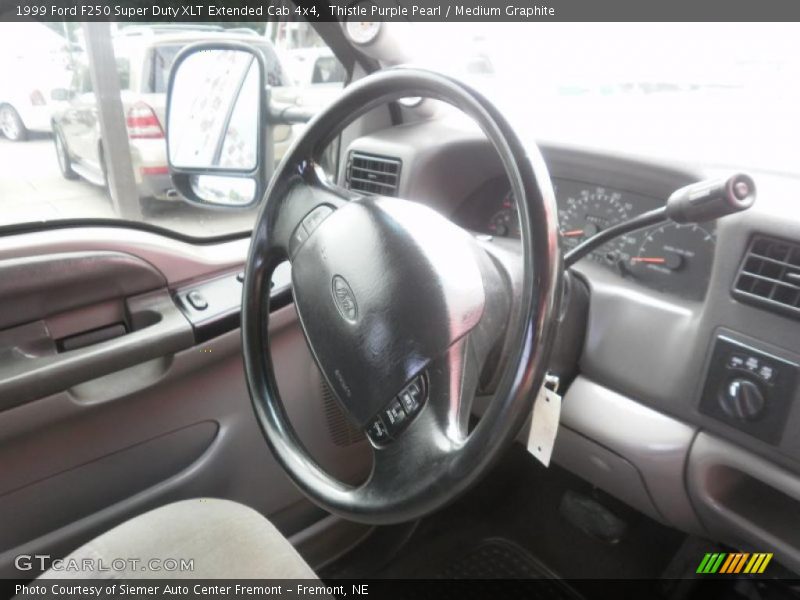 Thistle Purple Pearl / Medium Graphite 1999 Ford F250 Super Duty XLT Extended Cab 4x4