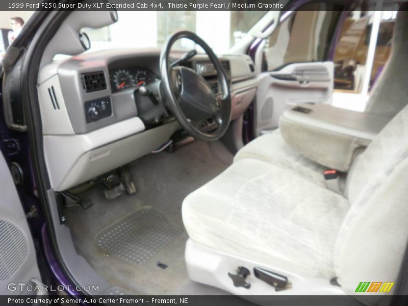 Thistle Purple Pearl / Medium Graphite 1999 Ford F250 Super Duty XLT Extended Cab 4x4