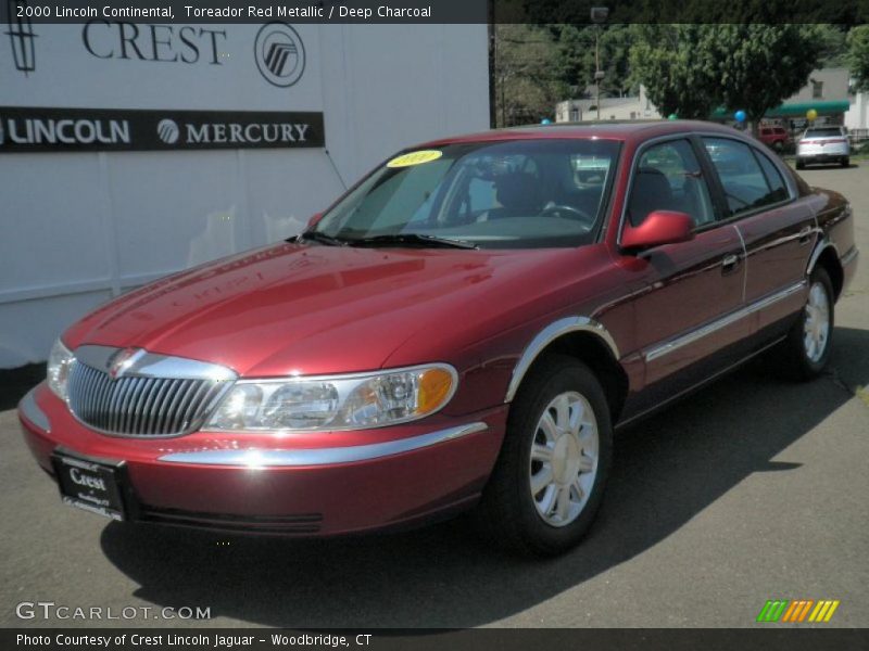 Toreador Red Metallic / Deep Charcoal 2000 Lincoln Continental