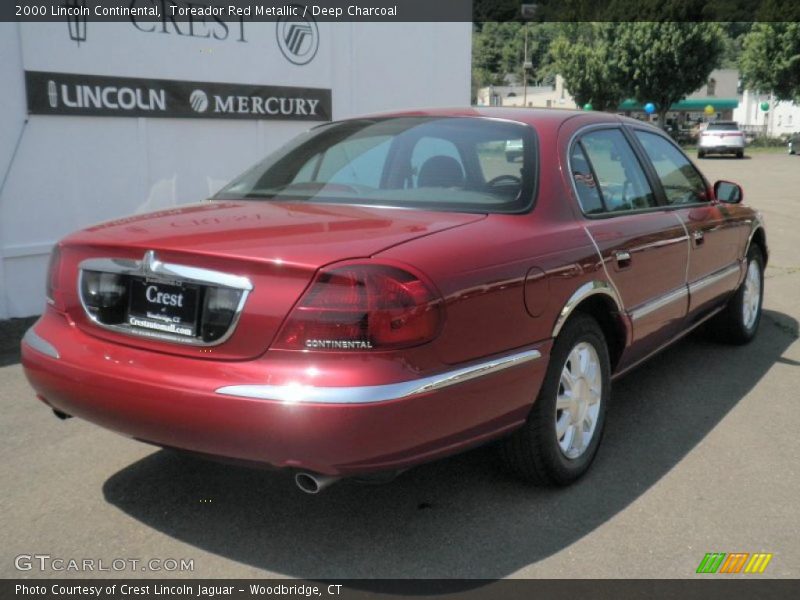 Toreador Red Metallic / Deep Charcoal 2000 Lincoln Continental