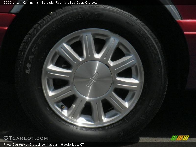 Toreador Red Metallic / Deep Charcoal 2000 Lincoln Continental