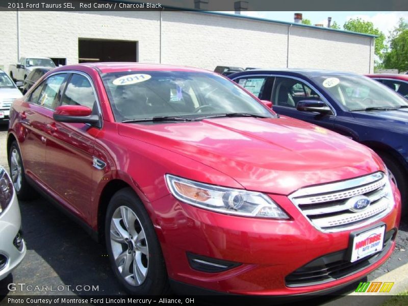 Red Candy / Charcoal Black 2011 Ford Taurus SEL