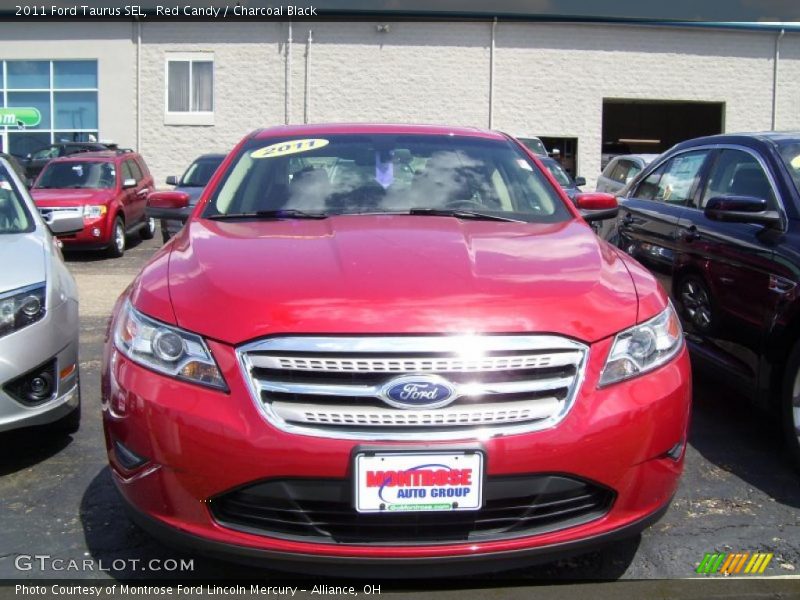 Red Candy / Charcoal Black 2011 Ford Taurus SEL