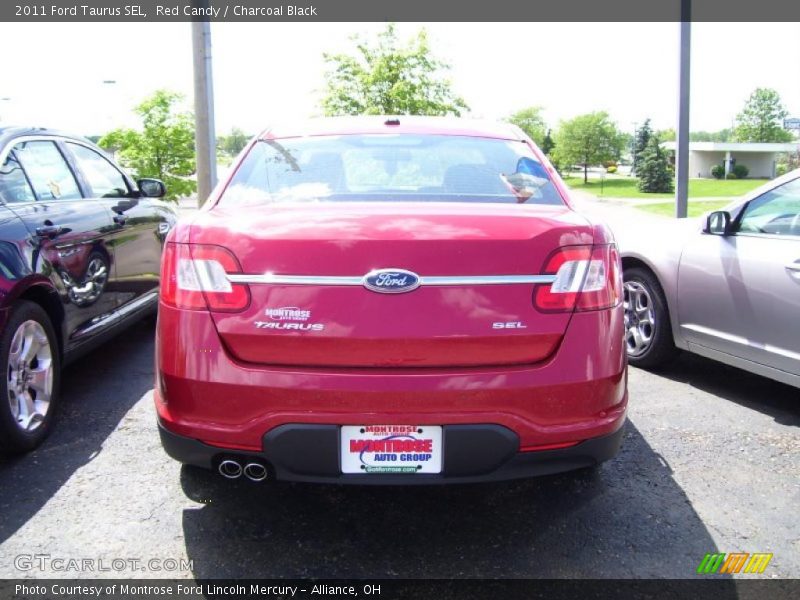 Red Candy / Charcoal Black 2011 Ford Taurus SEL