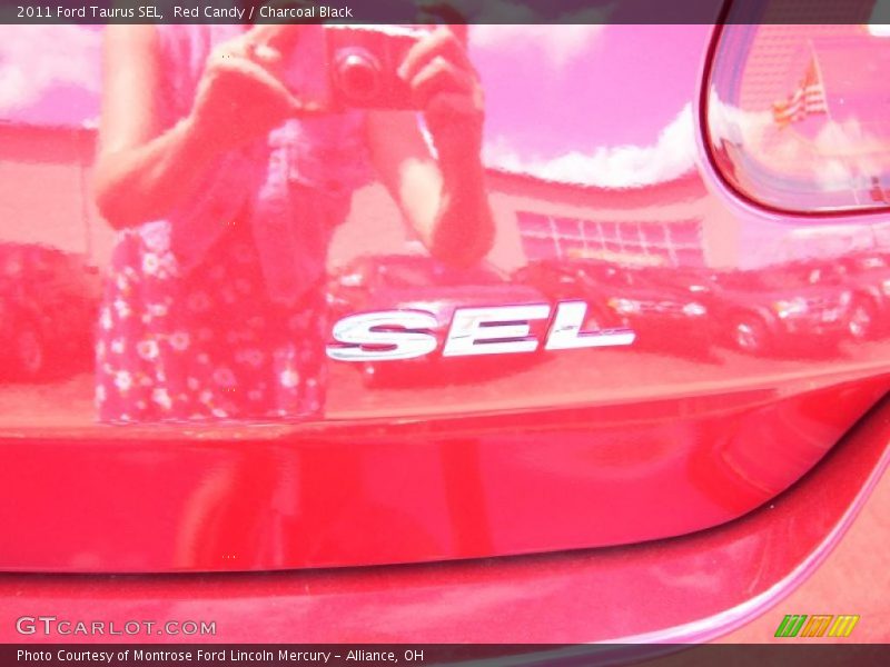 Red Candy / Charcoal Black 2011 Ford Taurus SEL