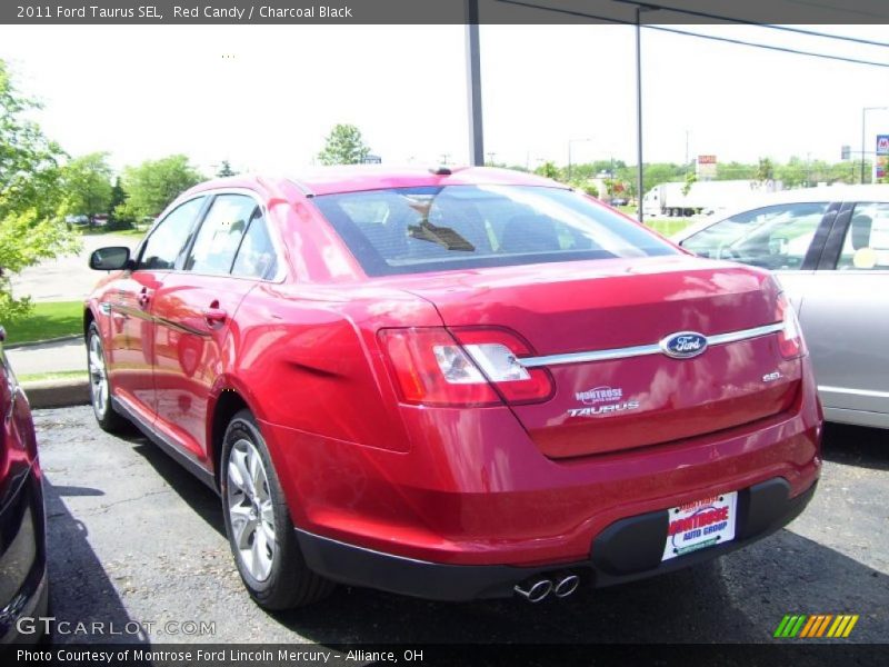 Red Candy / Charcoal Black 2011 Ford Taurus SEL