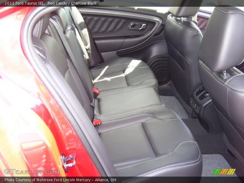 Red Candy / Charcoal Black 2011 Ford Taurus SEL