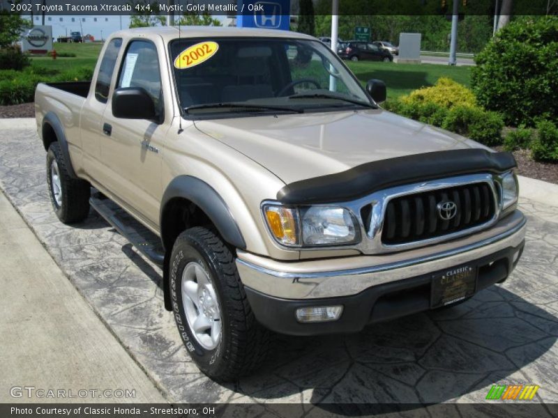 Mystic Gold Metallic / Oak 2002 Toyota Tacoma Xtracab 4x4