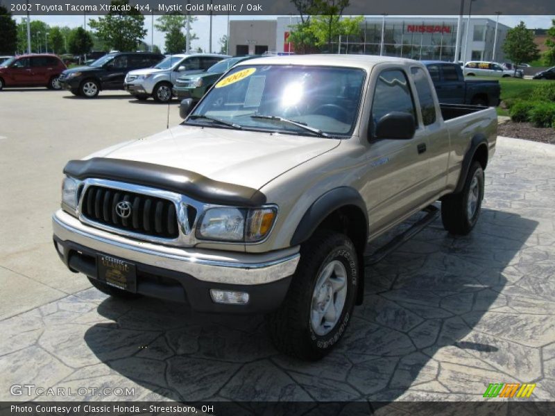 Mystic Gold Metallic / Oak 2002 Toyota Tacoma Xtracab 4x4