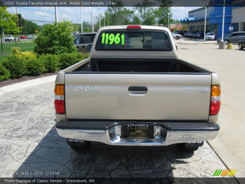 Mystic Gold Metallic / Oak 2002 Toyota Tacoma Xtracab 4x4