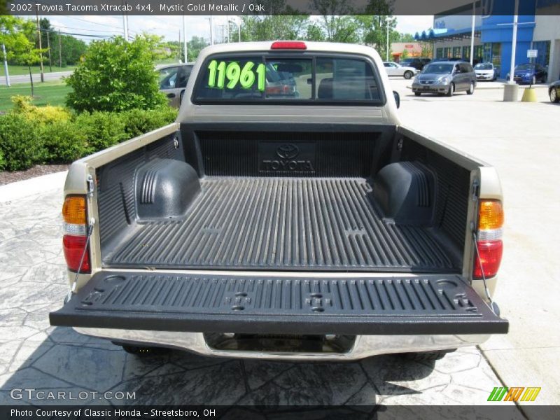 Mystic Gold Metallic / Oak 2002 Toyota Tacoma Xtracab 4x4