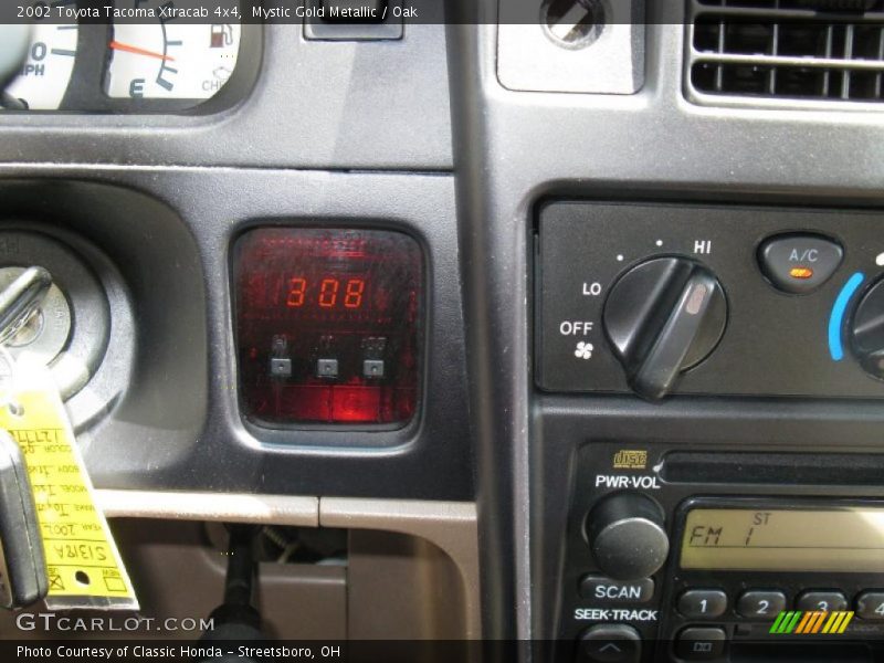 Mystic Gold Metallic / Oak 2002 Toyota Tacoma Xtracab 4x4