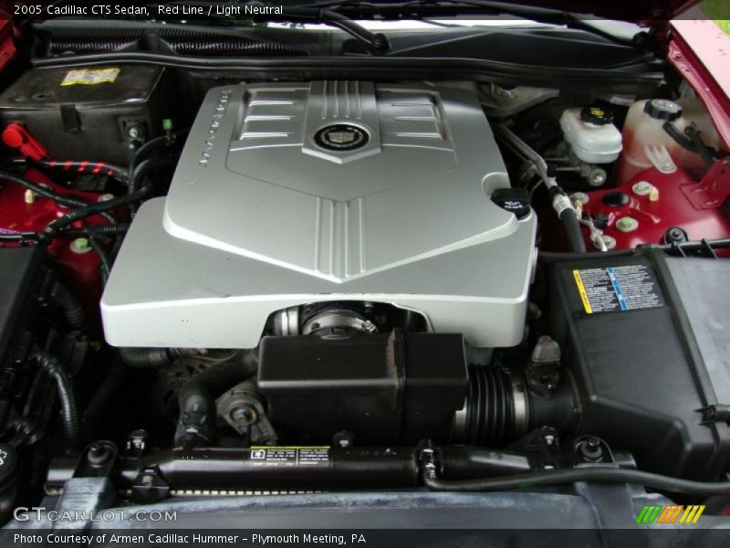 Red Line / Light Neutral 2005 Cadillac CTS Sedan