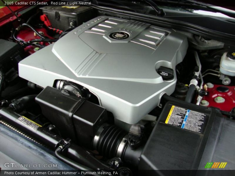 Red Line / Light Neutral 2005 Cadillac CTS Sedan