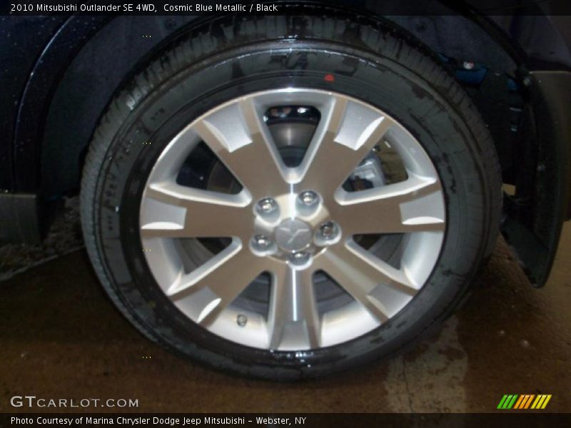 Cosmic Blue Metallic / Black 2010 Mitsubishi Outlander SE 4WD
