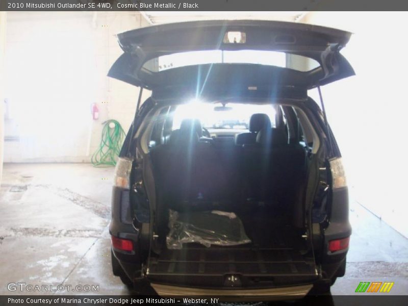 Cosmic Blue Metallic / Black 2010 Mitsubishi Outlander SE 4WD